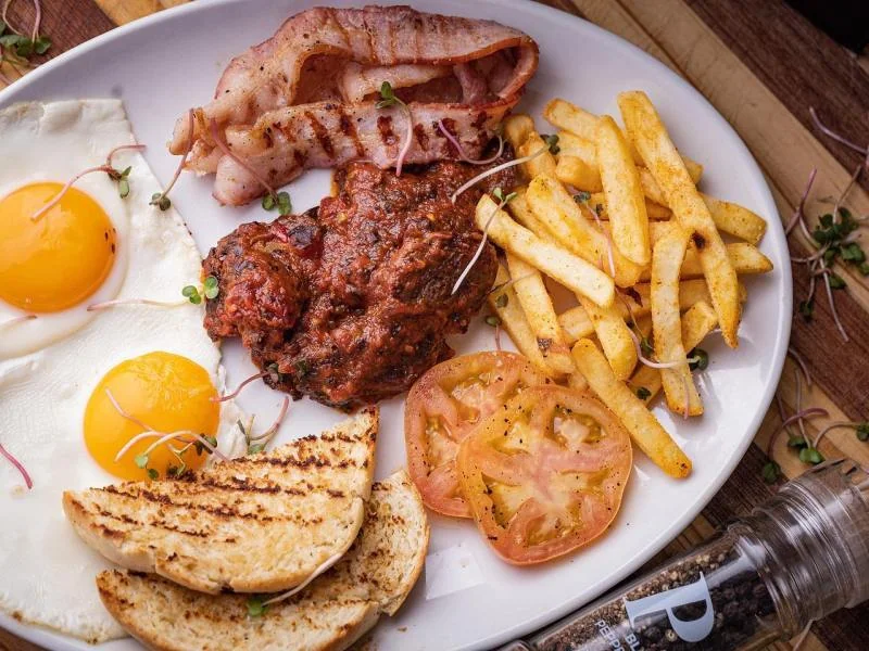 Breakfast plate featured in Ate at Design's restaurant listing; menus may change.